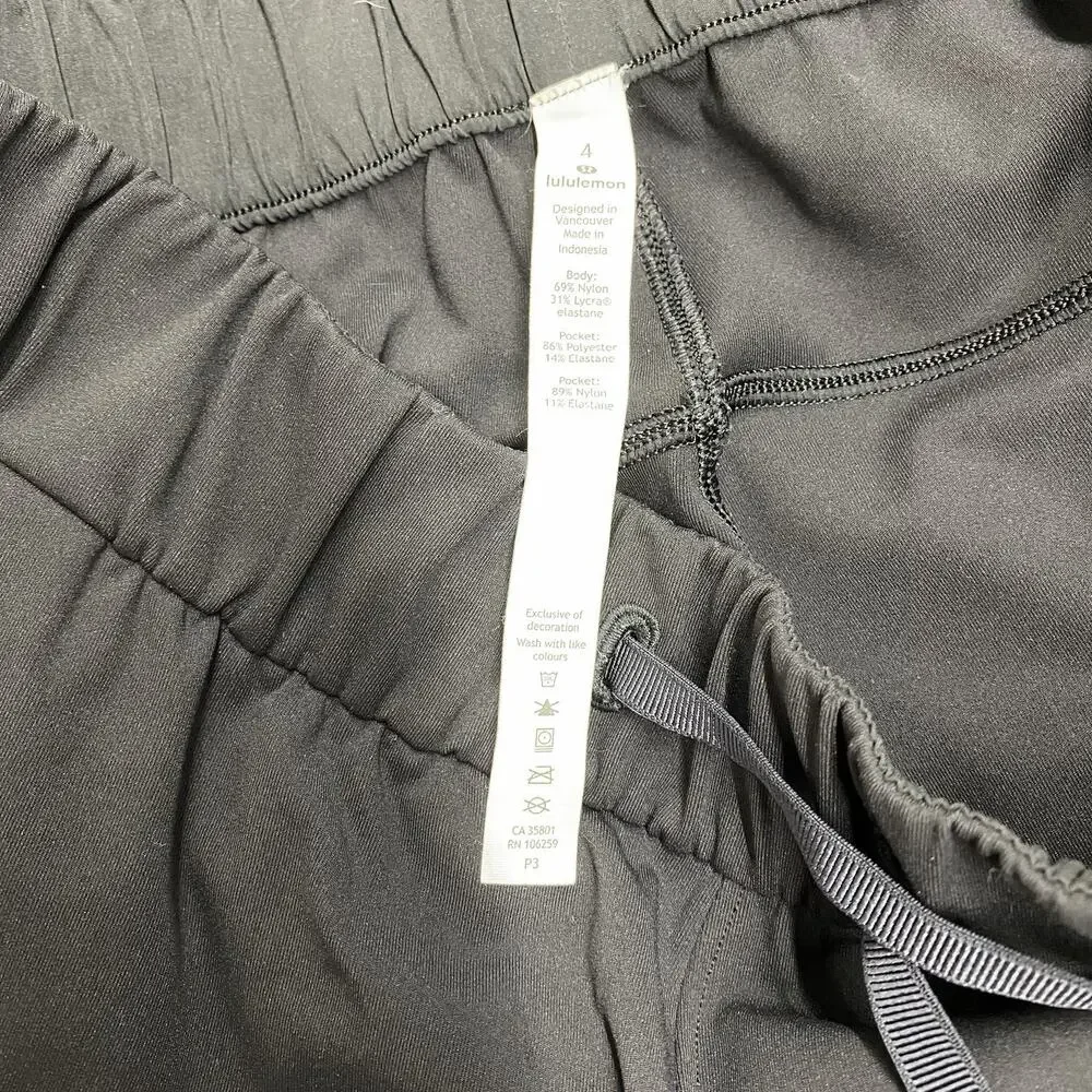 Lululemon On The Fly Pants Women 4 Black Luxtreme 28” Stretch Travel Tapered